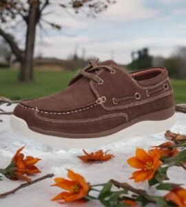Brown shoe on floral background